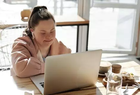 girl studying on laptop